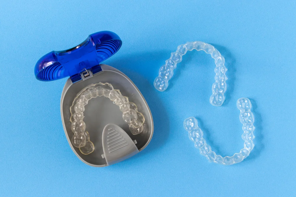 Invisalign,Braces,Or,Invisible,Retainer,On,Blue,Background