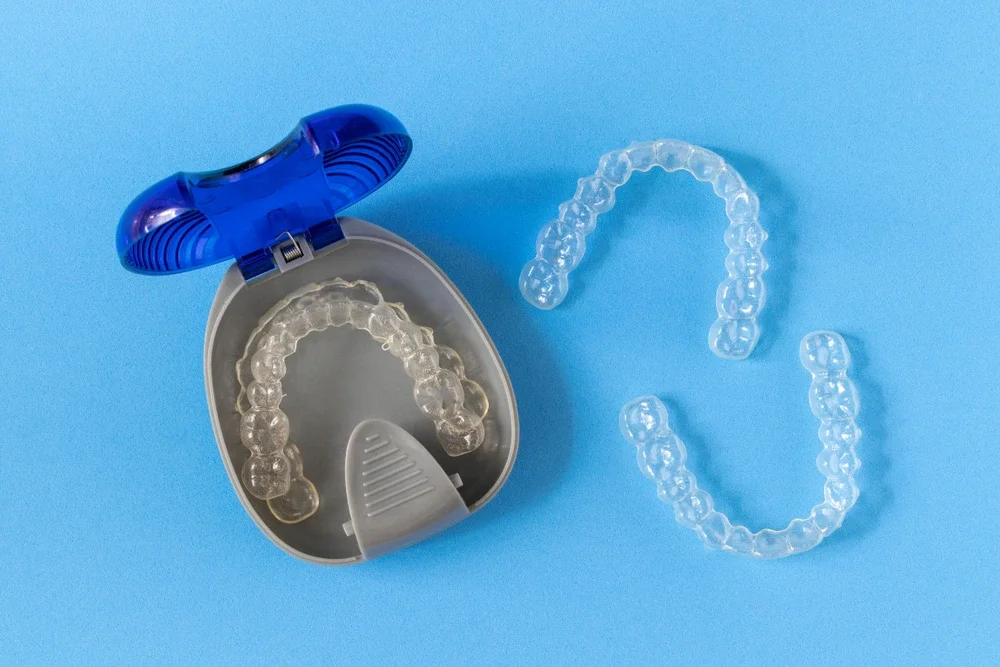 Clear dental aligners and storage case
